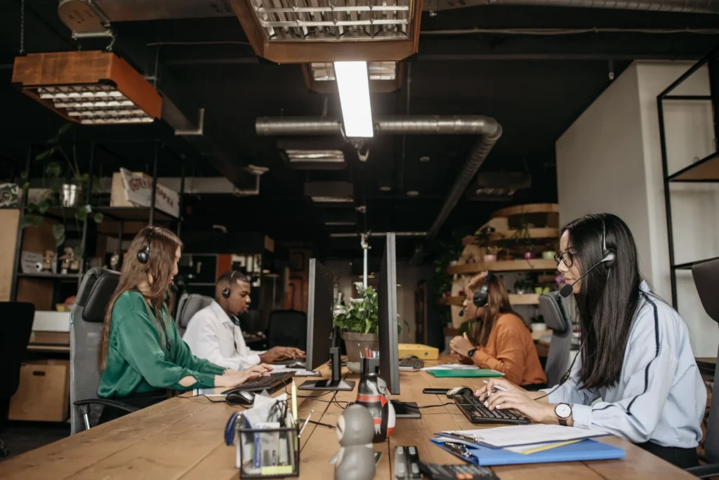 Synchramed collections call centre team on headsets
